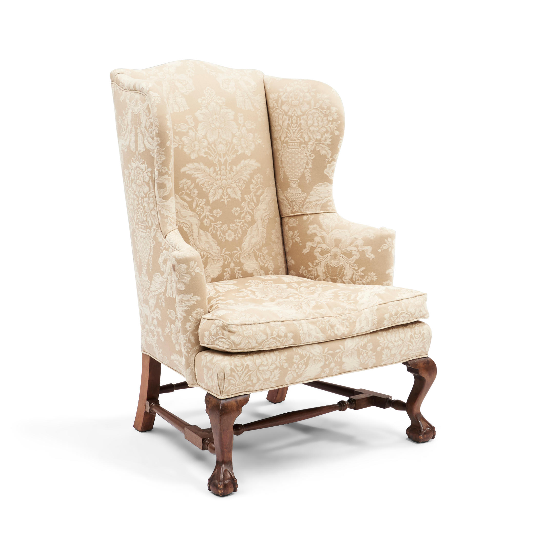 Appraisal: Chippendale-style Mahogany Upholstered Wingback Armchair with carved claw-and-ball feet and