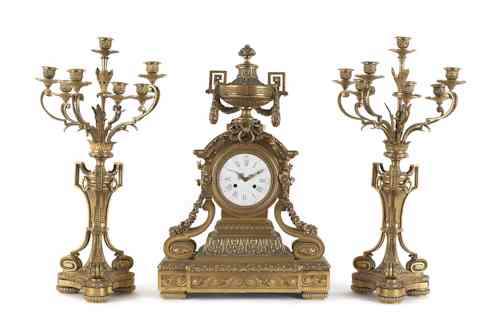 Appraisal: Massive Napoleon III gilt bronze clock garniture ca by Raingo