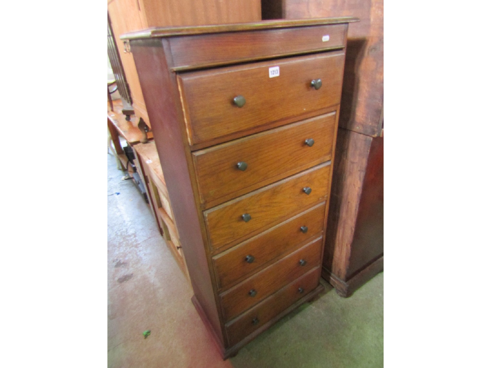 Appraisal: An early th century oak upright pedestal bedroom chest of