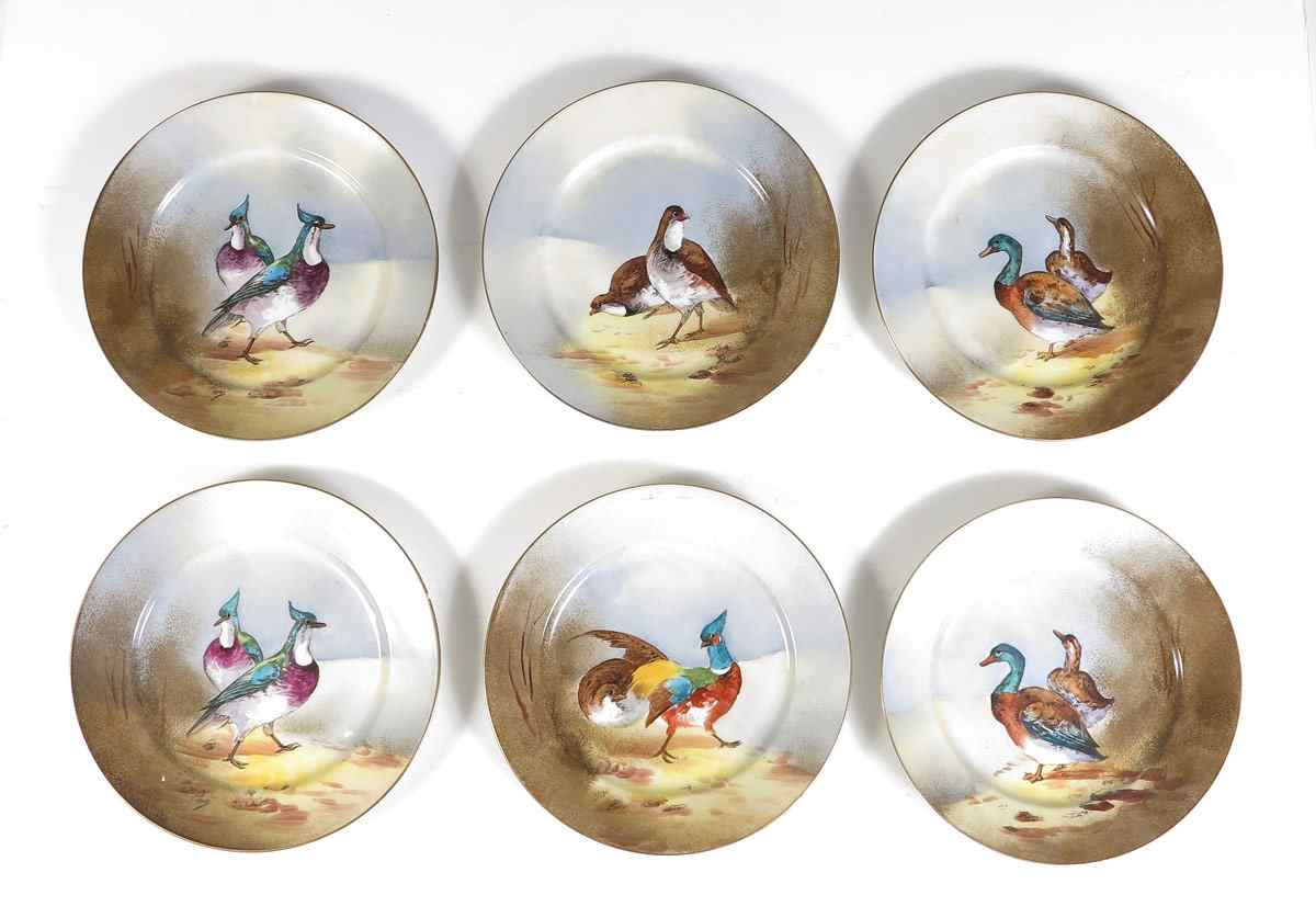 Appraisal: LIMOGES HAND PAINTED GAME PLATES plates with different types of