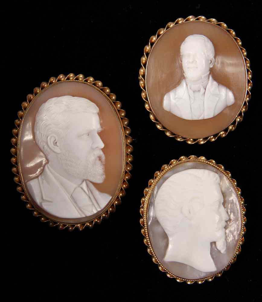 Appraisal: THREE SHELL CAMEO PORTRAITS OF GENTLEMEN- fitted as brooches in