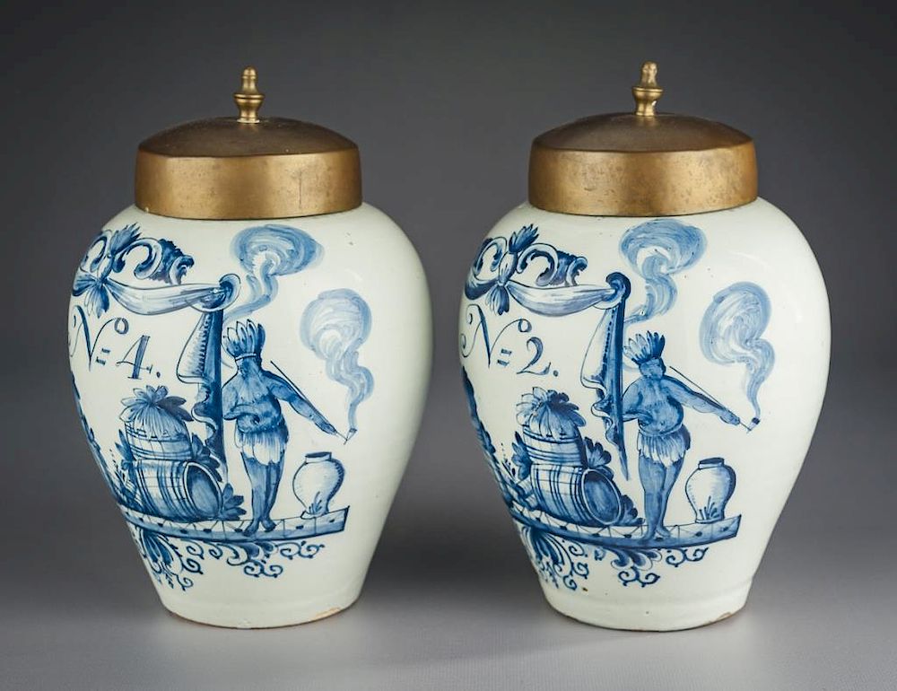 Appraisal: Pair of Early Delft Tobacco Jars Marked DWS DESCRIPTION Pair