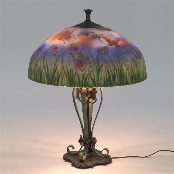 Appraisal: JANETTE REVERSE PAINTED GLASS LAMP WITH COLD PAINTED WROUGHT IRON