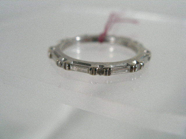 Appraisal: Ladies Diamond Eternity Guard Ring Nine baguette cut diamonds set