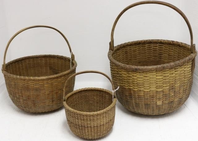 Appraisal: THREE GRADUATED MID-LATE TH CENTURY NANTUCKETSWING HANDLE LIGHT SHIP BASKETS