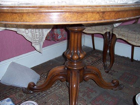 Appraisal: A Victorian walnut tilt top table the oval top on