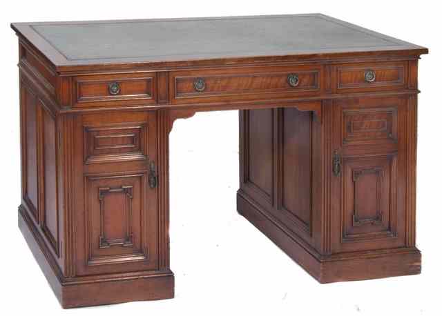 Appraisal: AN ANTIQUE MAHOGANY PEDESTAL DESK with green leather inset top