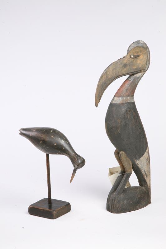 Appraisal: TWO CARVED BIRDS Pictured is a shorebird in a feeding