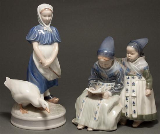 Appraisal: Two Royal Copenhagen porcelain figural groups Dutch children reading in