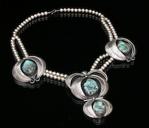 Appraisal: A Native American Silver and Turquoise Necklace A silver beaded