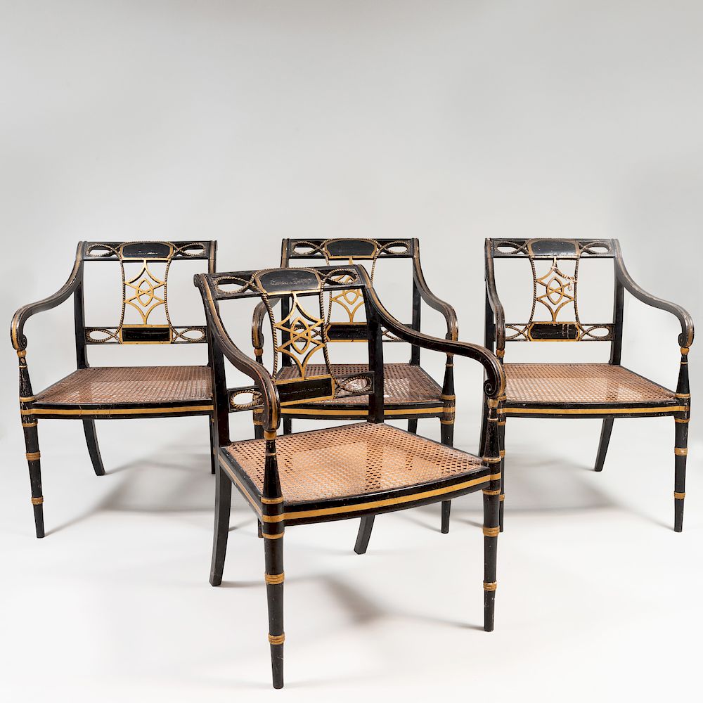 Appraisal: Set of Four Regency Ebonized Parcel-Gilt and Caned Armchairs One