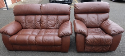 Appraisal: Brown leather seater settee and matching recliner