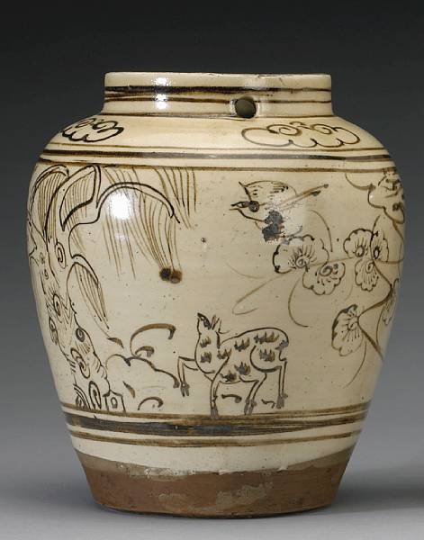 Appraisal: A Cizhou slip decorated stoneware jar Ming Dynasty Of ovoid