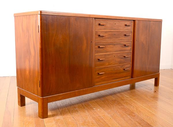 Appraisal: A DANISH FITTED SIDEBOARD c A DANISH FITTED SIDEBOARD c