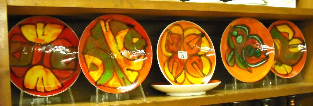 Appraisal: Six Poole Pottery Delphis pattern plates each diameter