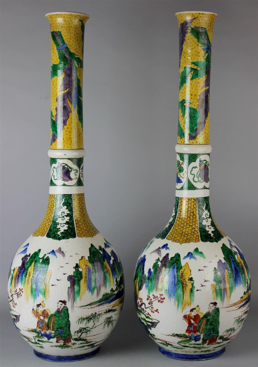 Appraisal: PAIR OF JAPANESE TALL LONG-NECKED VASES th C with green