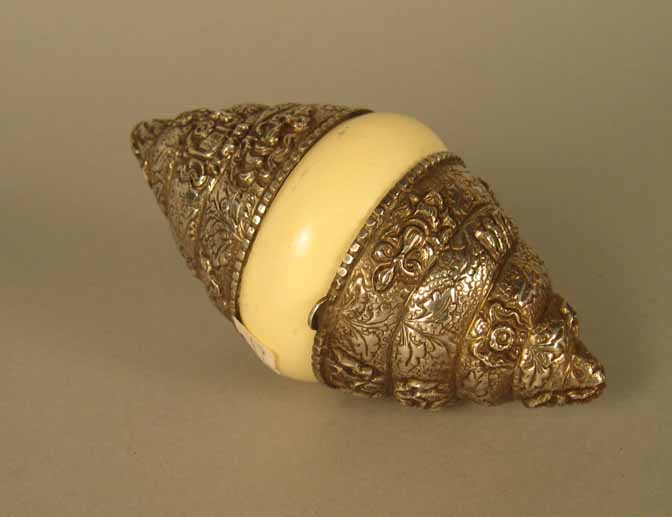 Appraisal: Continental silver and ivorine etrog The spiral conical ends embossed