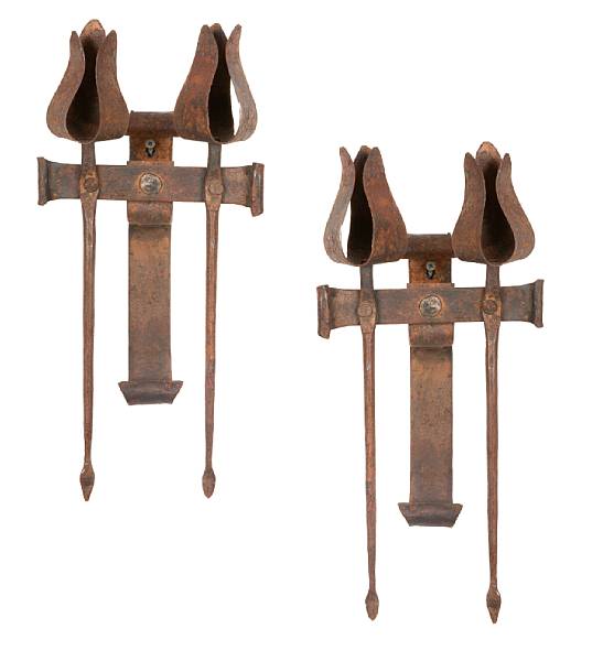 Appraisal: A pair of iron sconces height in