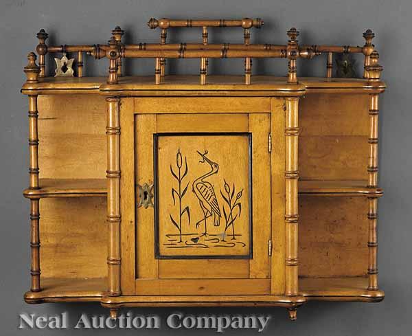 Appraisal: An American Aesthetic Faux Bamboo Maple and Ebonized Hanging Curio