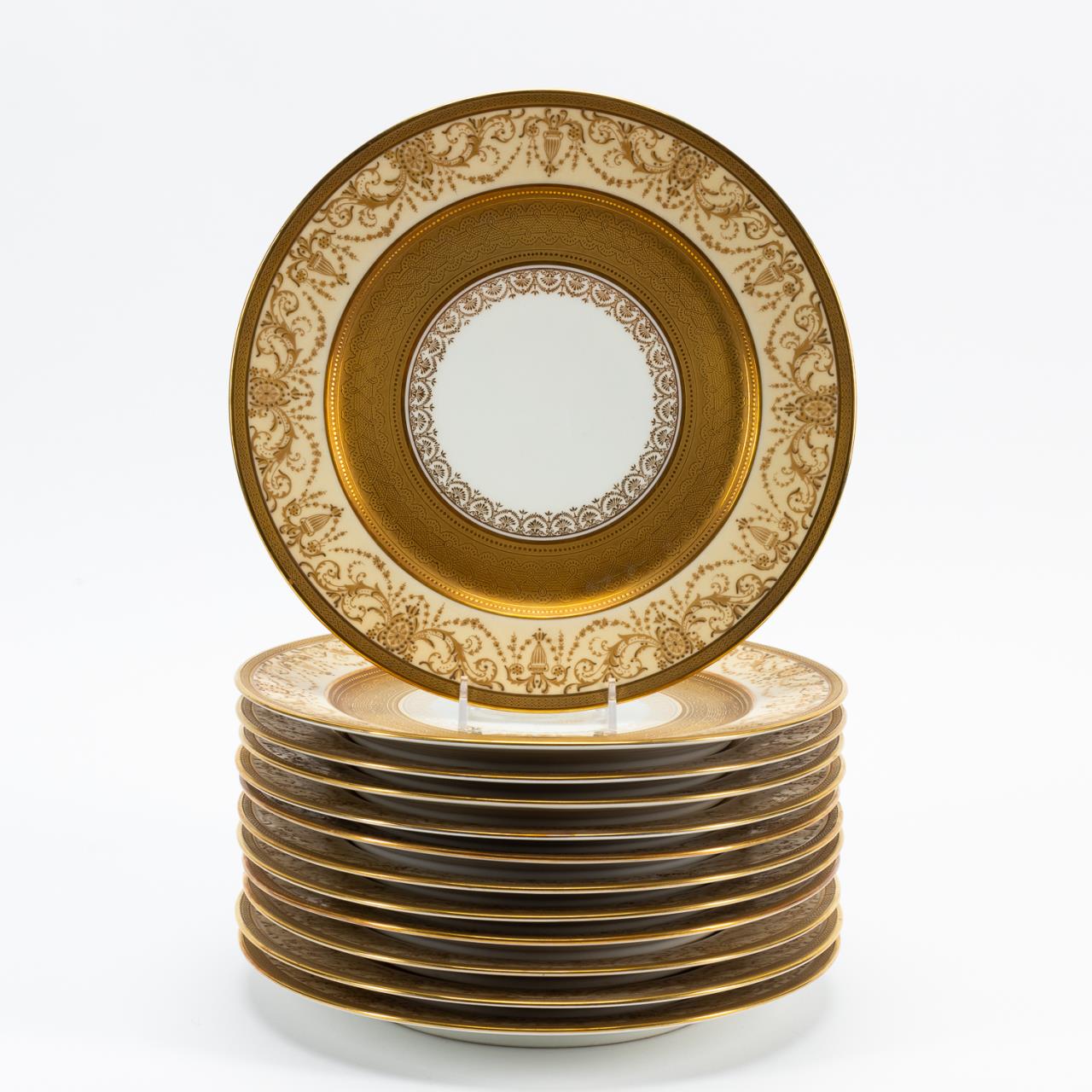 Appraisal: SET OF GILT ENCRUSTED LIMOGES SERVICE PLATES William Guerin French