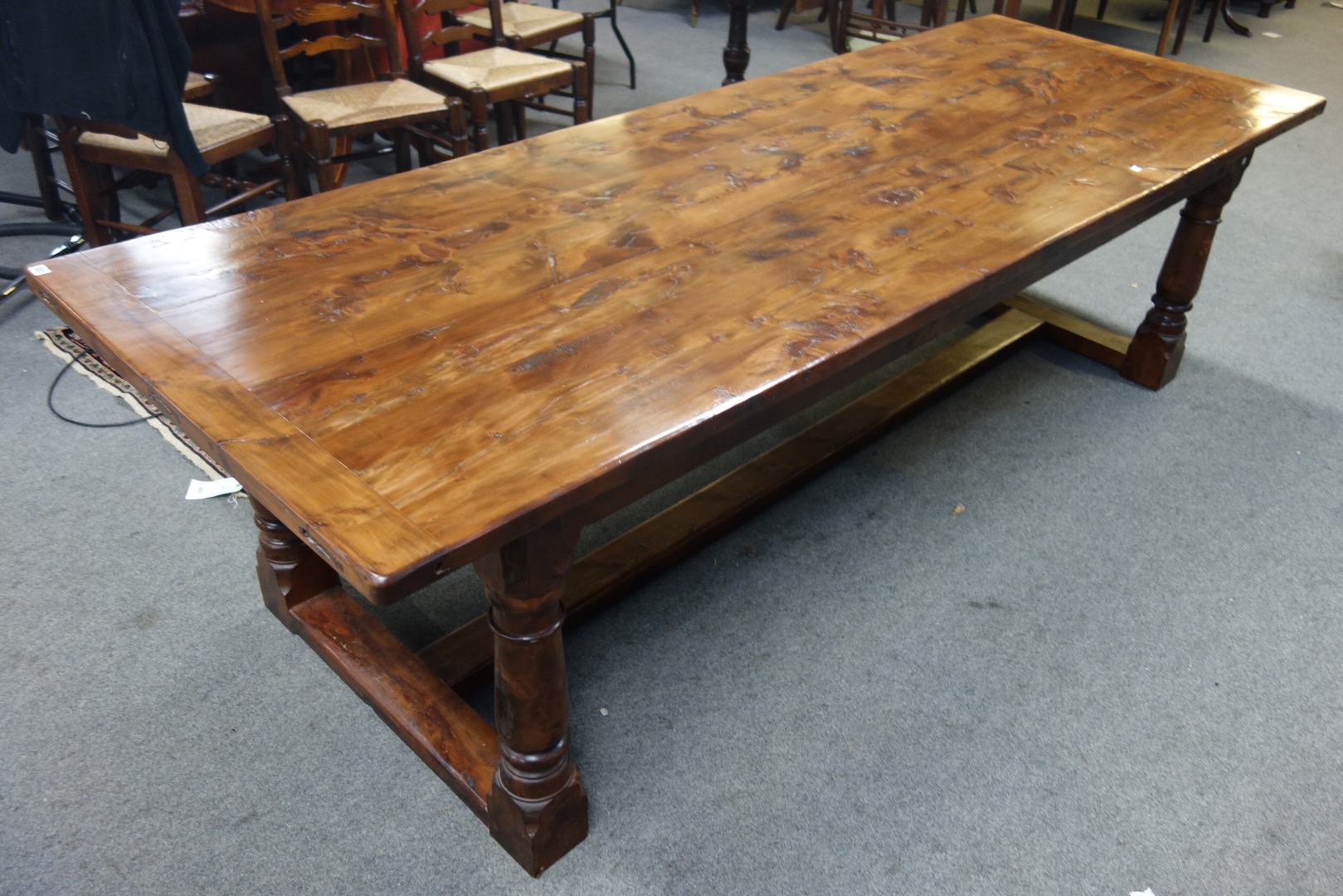 Appraisal: A th century style yew refectory table the cleated plank