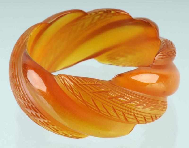 Appraisal: Bakelite Carved Bracelet Description CORRECTION Bracelet is Bakelite applejuice Condition