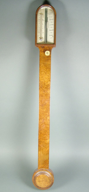 Appraisal: A th century stick barometer the burr walnut case with