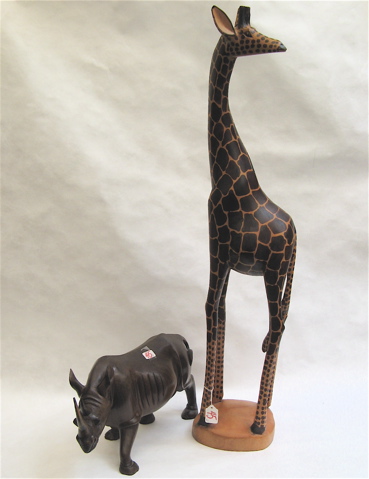 Appraisal: TWO CARVED WOOD ANIMALS the tall giraffe H together with