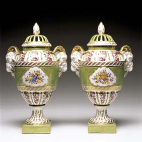 Appraisal: PAIR ANTIQUE FRENCH COVERED URNS Pair antique French porcelain covered