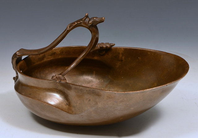 Appraisal: A GRAND TOUR BRONZE VESSEL of oval lily form form