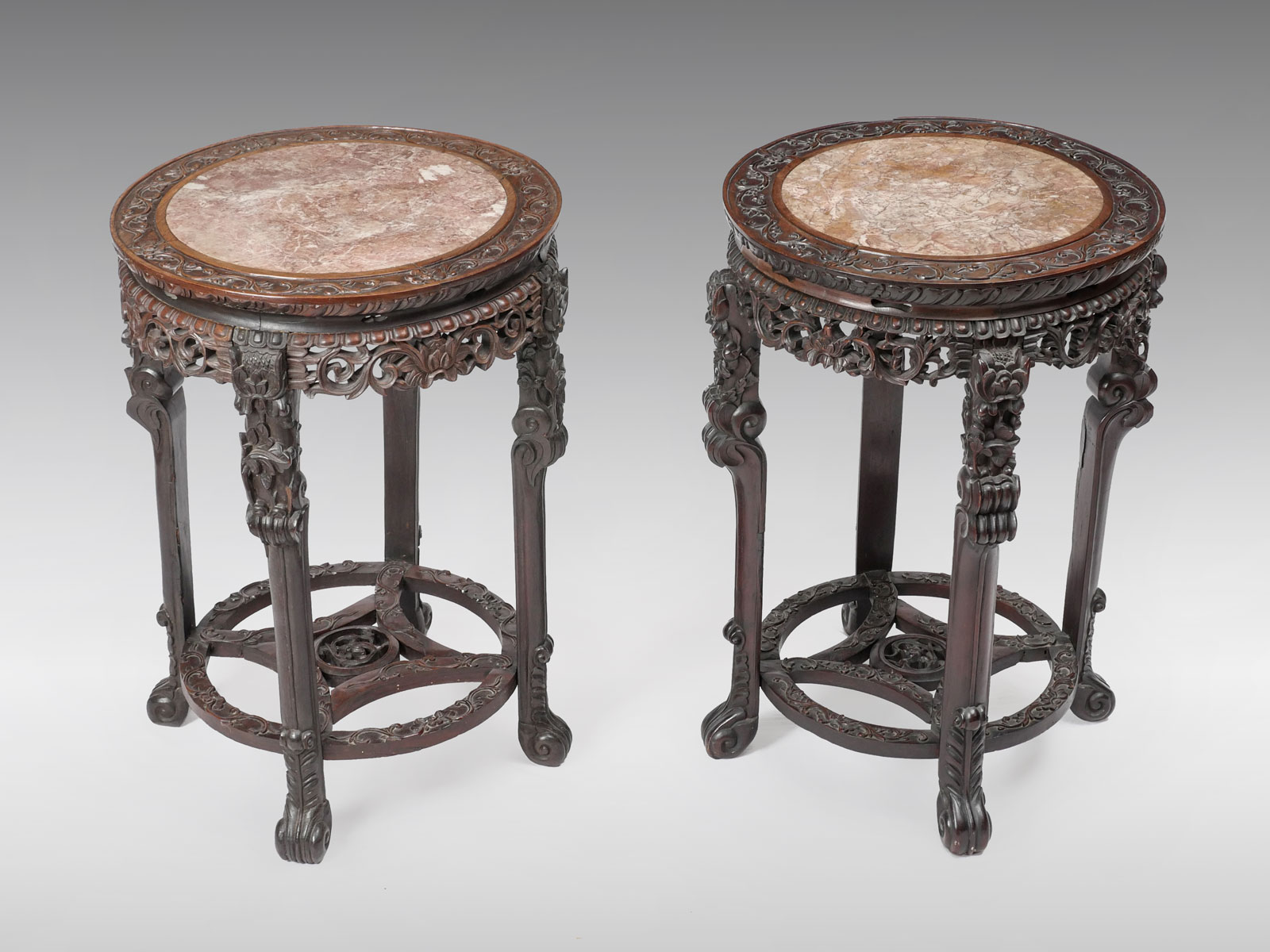 Appraisal: PAIR OF TALL CHINESE CARVED MARBLE TOP STANDS Large Chinese