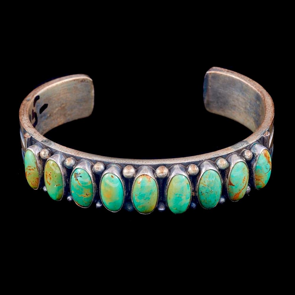 Appraisal: NAVAJO CUFF BRACELET An old pawn turquoise and sterling silver