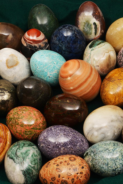 Appraisal: A COLLECTION OF STONE EGGS the largest high