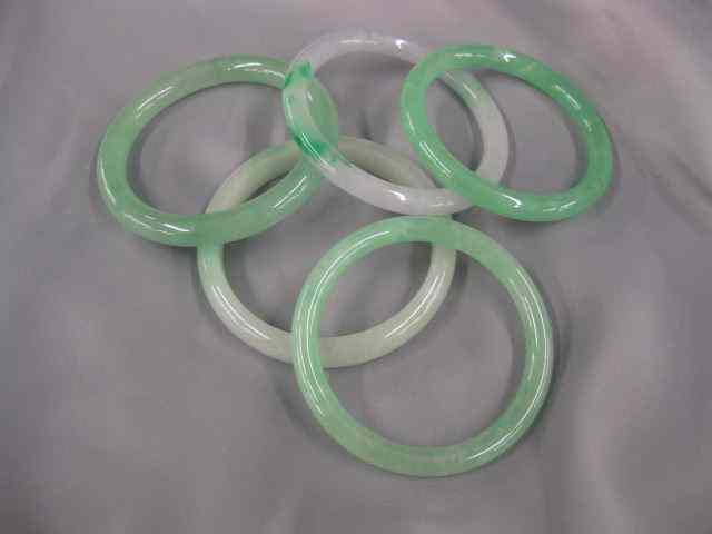 Appraisal: Jade Bangle Bracelets estate lot mostly mottled greens on having