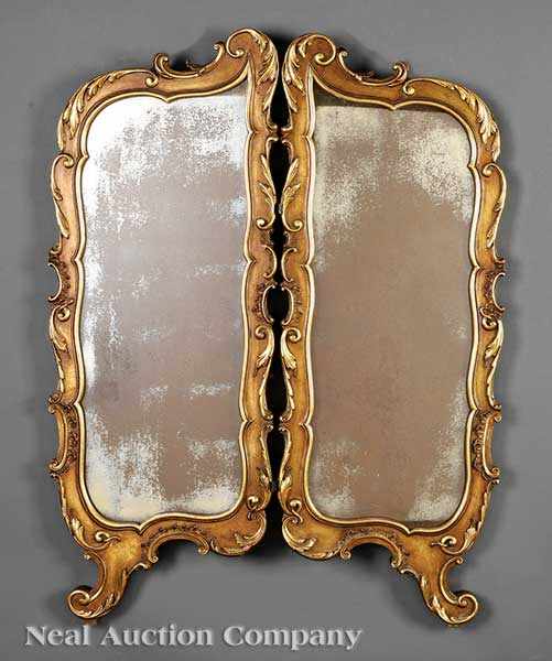 Appraisal: A French Rococo-Style Carved and Giltwood Mirror the two shaped