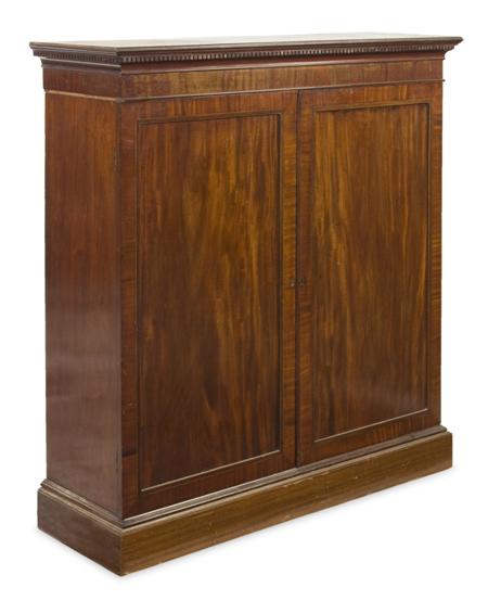 Appraisal: A Victorian mahogany estate cabinet the dentil cornice over plain