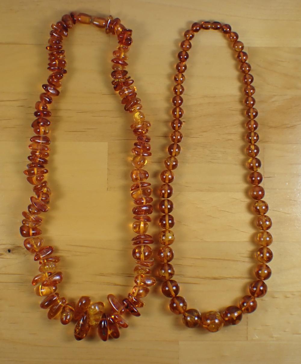 Appraisal: TWO NATURAL BALTIC AMBER BEAD NECKLACES including a strand with