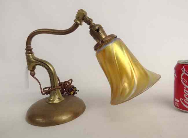 Appraisal: Early weighted base brass lamp with unsigned art glass shade