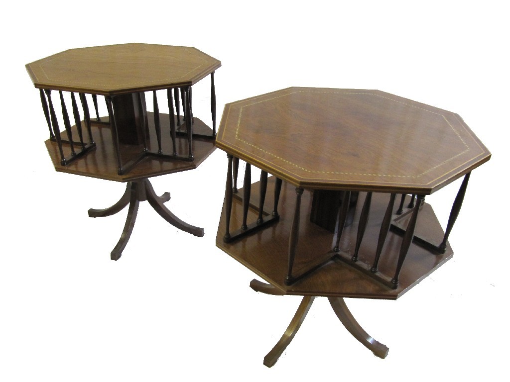 Appraisal: A pair of Regency style s revolving octagonal tables raised