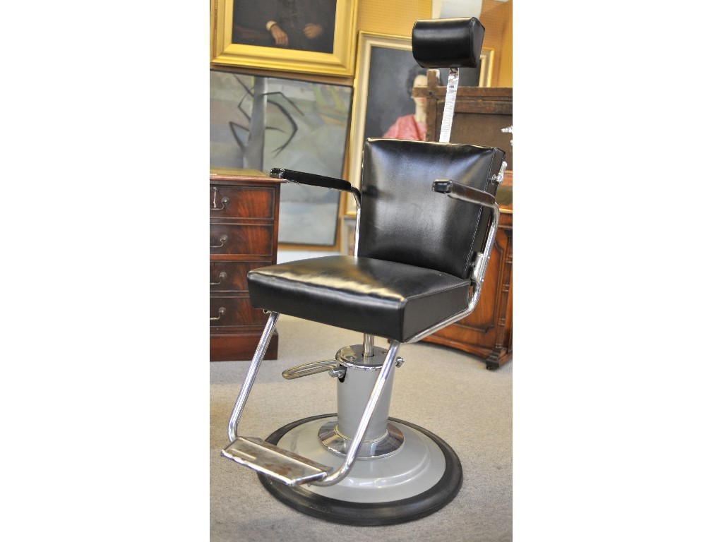 Appraisal: Black leather dentist chair