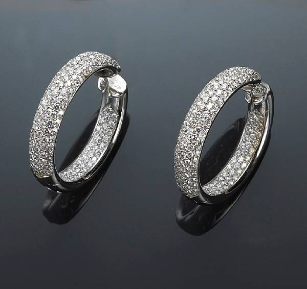 Appraisal: A pair of diamond hoop earrings Leo Pizzo both signed