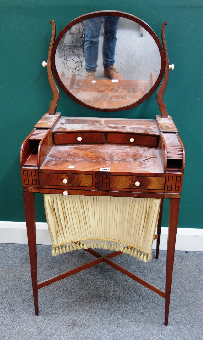 Appraisal: A small Regency mahogany dressing work table with swing mirror