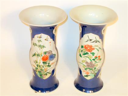 Appraisal: Pair of Chinese famille rose and powder blue beaker vases