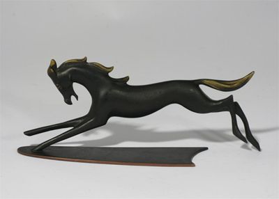 Appraisal: A Rena Rosethal patinated bronze figure of a galloping horse