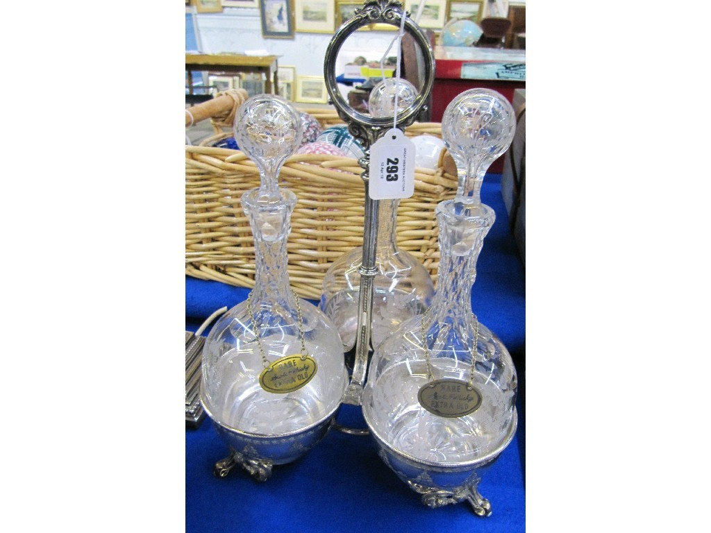 Appraisal: Victorian silver plate three bottle decanter stand