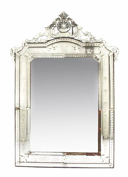 Appraisal: A Venetian etched glass mirror losses height ft in width