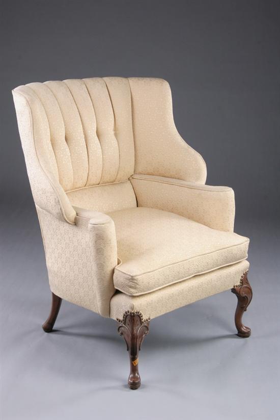 Appraisal: CONTEMPORARY CREAM COLOR UPHOLSTERED EASY CHAIR th century Rectangular padded