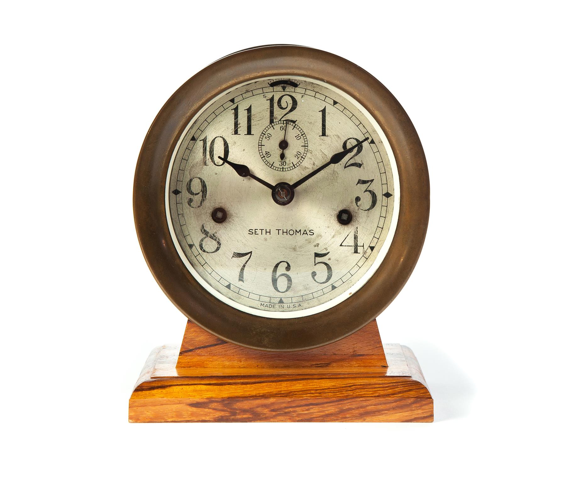 Appraisal: SETH THOMAS BRASS SHIP'S CLOCK ON OAK BASE American st