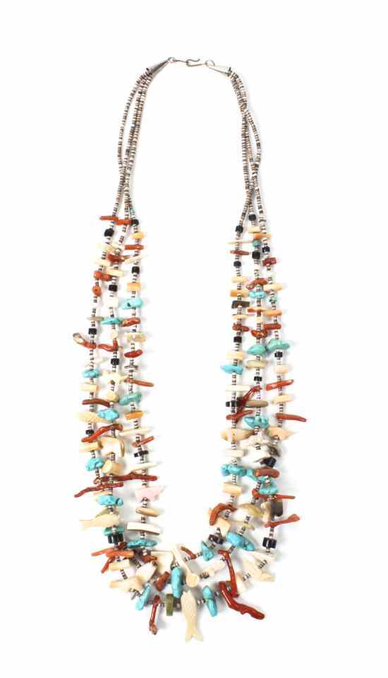 Appraisal: A Zuni Three Strand Fetish Necklace with turquoise coral fossil