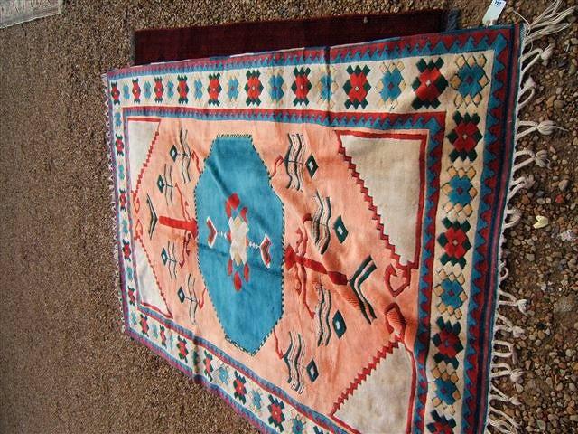 Appraisal: A Yoruk Turkish large peach ground rug with stylised floral